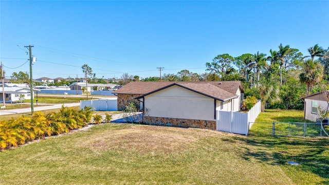 view of property exterior featuring a yard