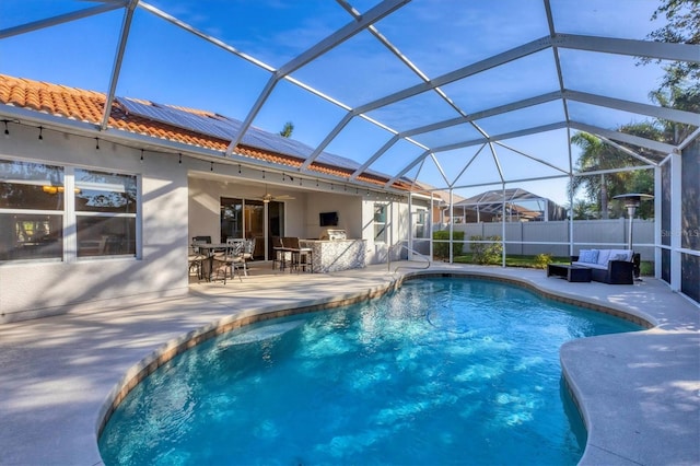 view of swimming pool with a fenced in pool, an outdoor living space, a patio area, and outdoor dry bar