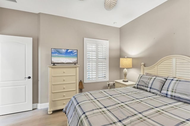 11265 Mc Dermott Ct, Englewood, FL 34223 - bedroom featuring light wood-style floors and baseboards