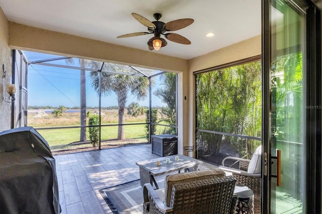 11265 Mc Dermott Ct, Englewood, FL 34223 - sunroom featuring a ceiling fan