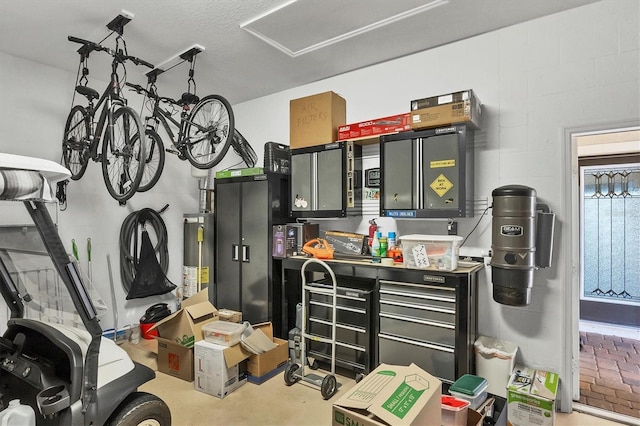 11265 Mc Dermott Ct, Englewood, FL 34223 - garage featuring a central vacuum unit