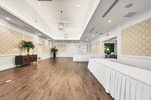 11265 Mc Dermott Ct, Englewood, FL 34223 - hall with wallpapered walls, wood finished floors, an accent wall, and recessed lighting