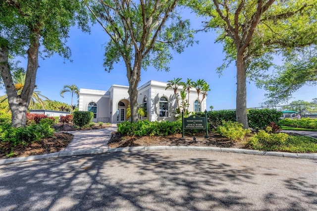11265 Mc Dermott Ct, Englewood, FL 34223 - mediterranean / spanish-style home featuring stucco siding and french doors