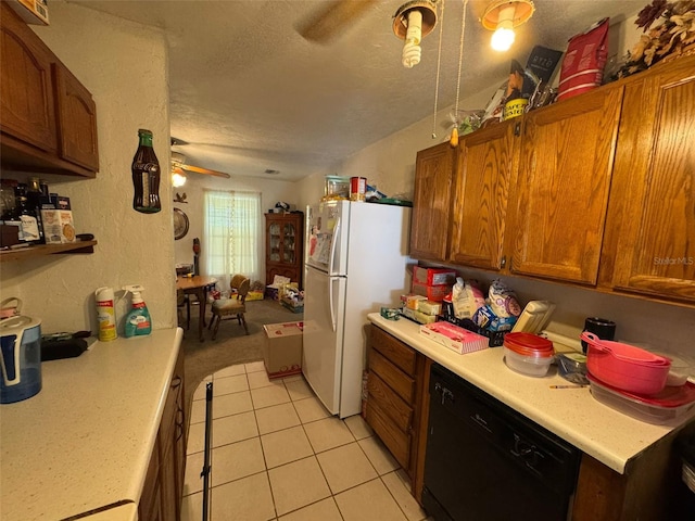 kitchen featuring ceiling fan, light tile patterned floors, a textured ceiling, black dishwasher, and white fridge