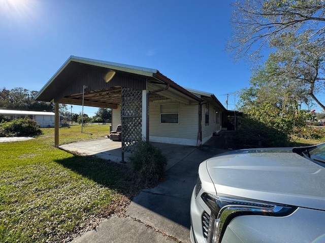 view of property exterior with a yard