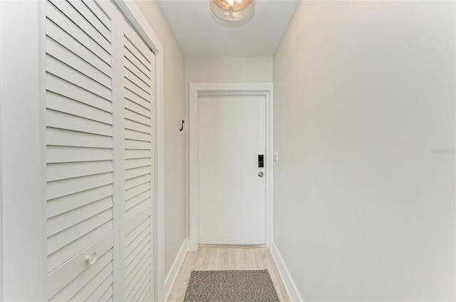 doorway to outside featuring light wood-type flooring