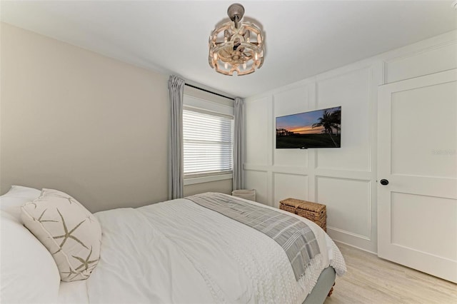 bedroom with light wood-type flooring