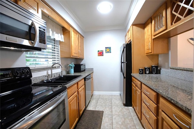 kitchen featuring ornamental molding, sink, black appliances, light tile patterned floors, and stone countertops