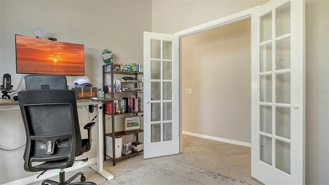 office area with french doors and light tile patterned floors