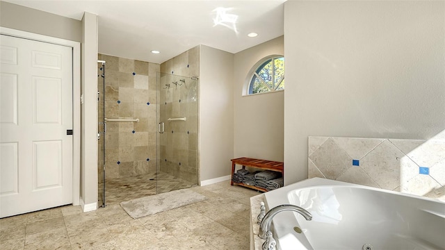 bathroom with independent shower and bath