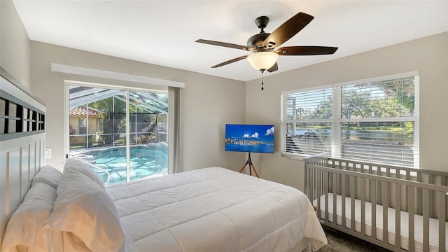 bedroom featuring ceiling fan and access to outside