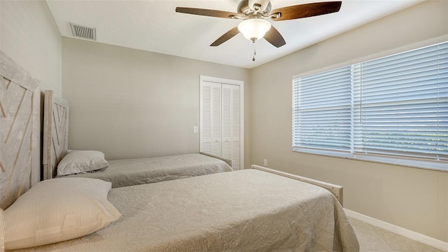 bedroom with a closet and ceiling fan