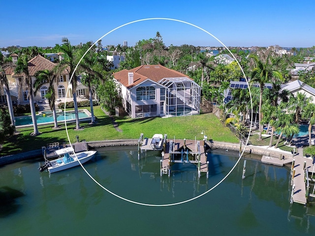 dock area featuring a water view and a lawn