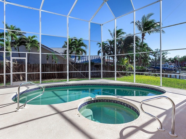 508 Siesta Dr, Sarasota, FL 34242 - view of swimming pool with an in-ground hot tub, a lanai, and a patio area