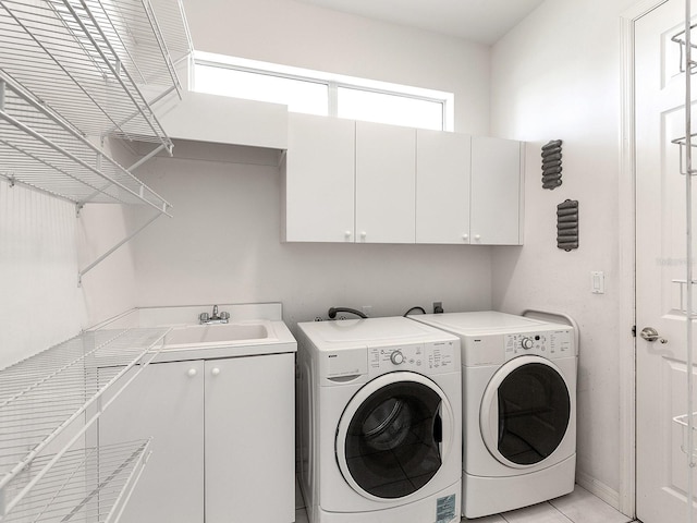 508 Siesta Dr, Sarasota, FL 34242 - laundry room with cabinet space and washer and dryer