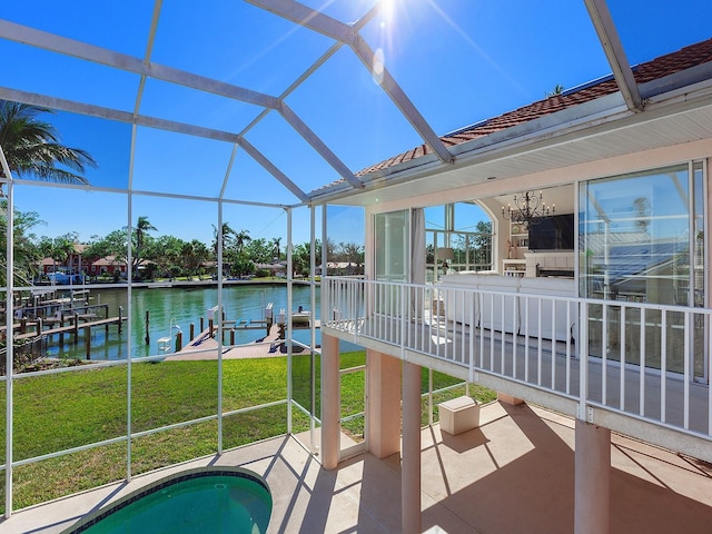 508 Siesta Dr, Sarasota, FL 34242 - view of patio with boat lift, a boat dock, a water view, and a jacuzzi