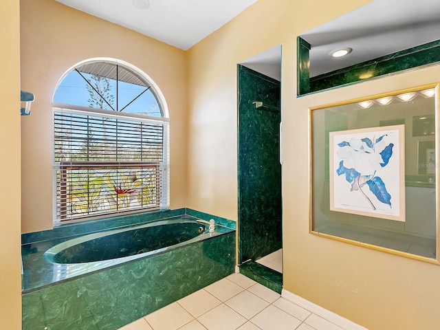 508 Siesta Dr, Sarasota, FL 34242 - full bath featuring a garden tub, tile patterned floors, and a shower