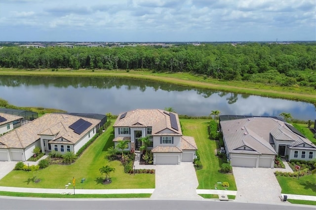 birds eye view of property with a water view