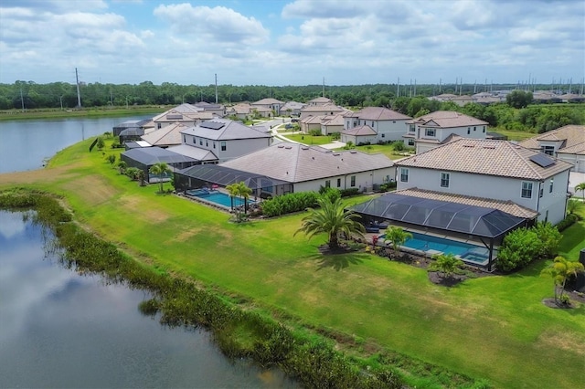 bird's eye view with a water view