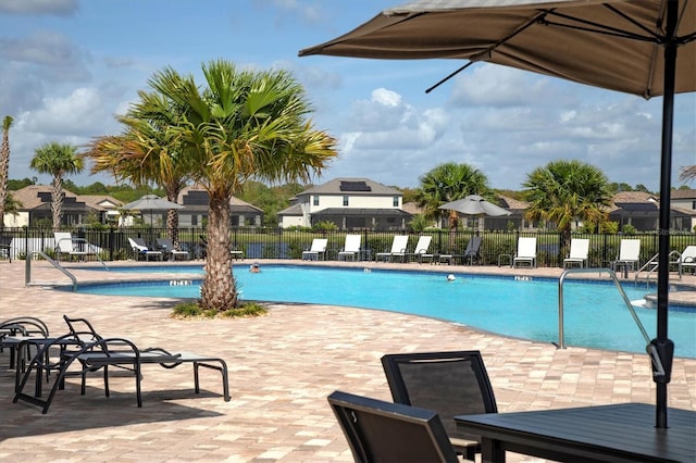 view of swimming pool featuring a patio