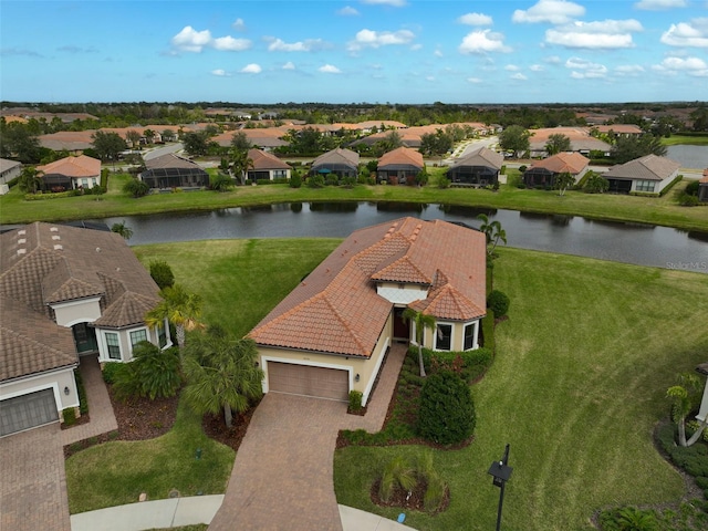 drone / aerial view with a water view