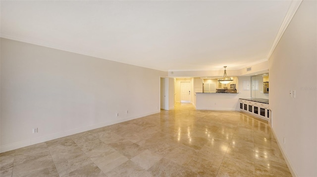 unfurnished living room with crown molding, visible vents, and baseboards