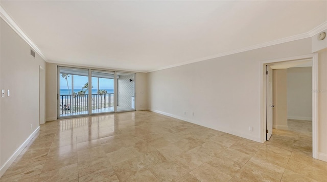 spare room featuring a water view, visible vents, baseboards, and crown molding