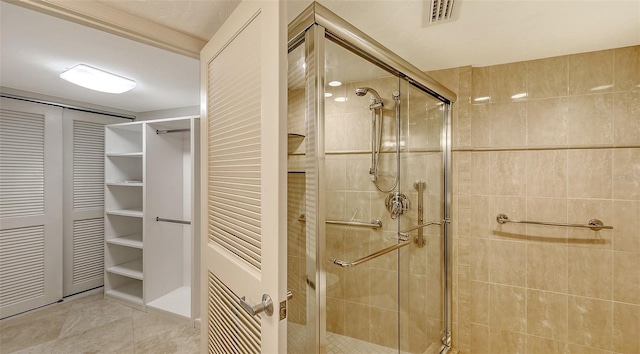 full bath featuring a closet, visible vents, and a stall shower