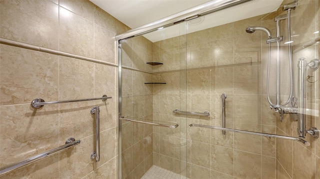 full bathroom with a shower stall