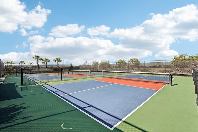 view of tennis court featuring basketball court