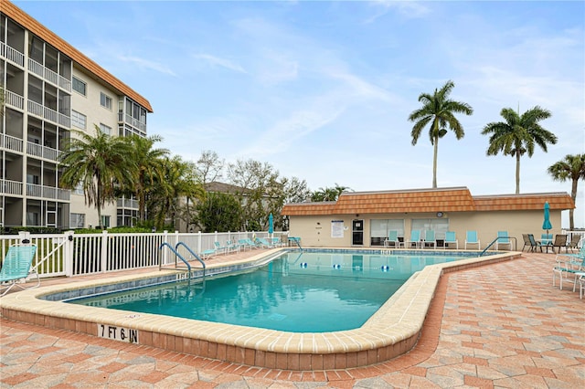 view of swimming pool featuring a patio