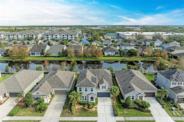 bird's eye view with a water view