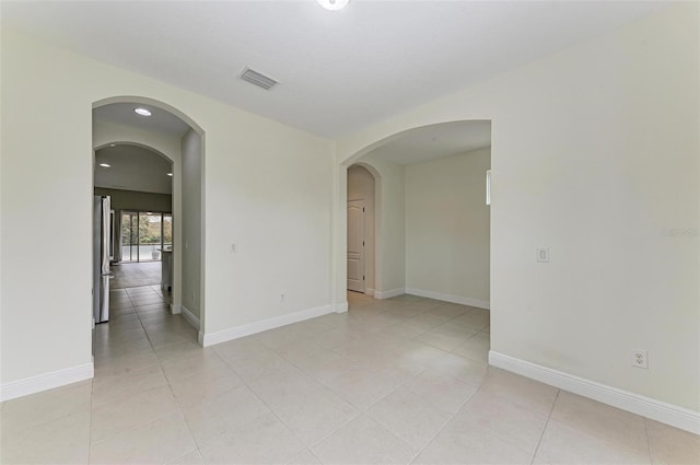 view of tiled spare room