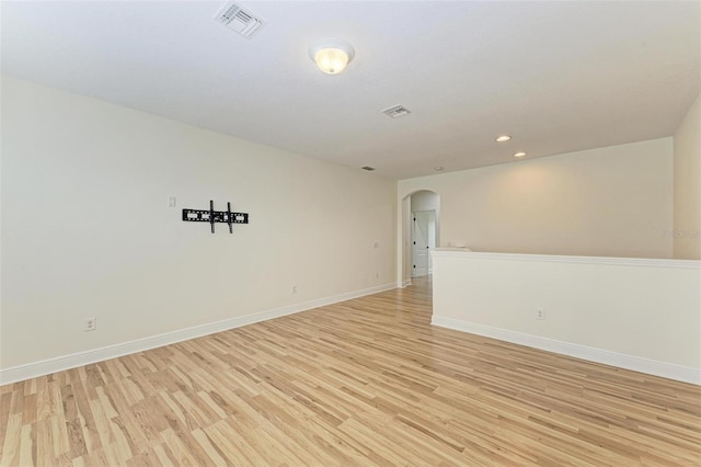 unfurnished room featuring light hardwood / wood-style flooring