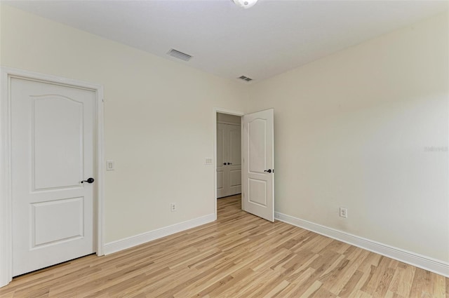 unfurnished bedroom featuring light hardwood / wood-style flooring