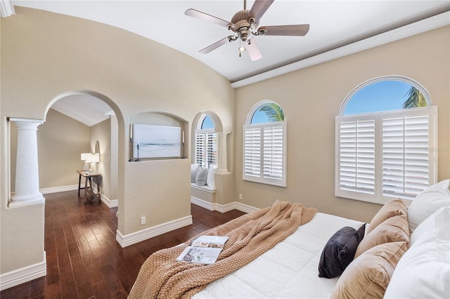 bedroom with ceiling fan, dark hardwood / wood-style flooring, lofted ceiling, and multiple windows