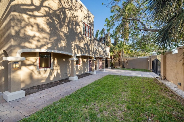 8855 Midnight Pass Rd, Sarasota, FL 34242 - view of yard with a gate