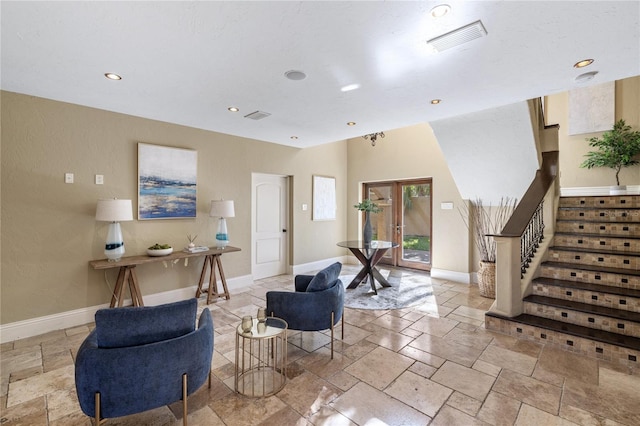 8855 Midnight Pass Rd, Sarasota, FL 34242 - living area with stone tile flooring, stairs, recessed lighting, and french doors