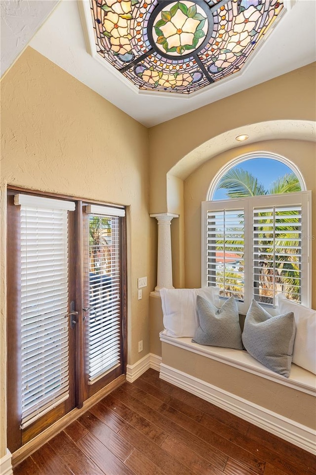 8855 Midnight Pass Rd, Sarasota, FL 34242 - sitting room featuring healthy amount of natural light and hardwood / wood-style flooring