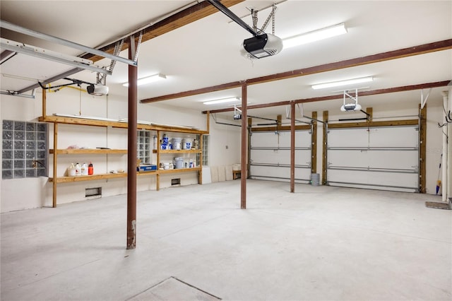 garage featuring a garage door opener