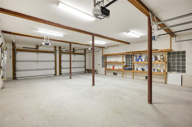 garage featuring a garage door opener