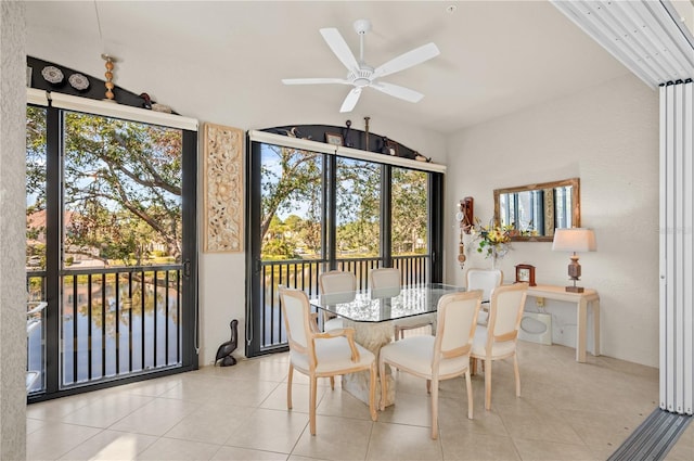 interior space with ceiling fan