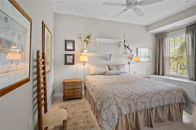 bedroom featuring ceiling fan and light hardwood / wood-style floors