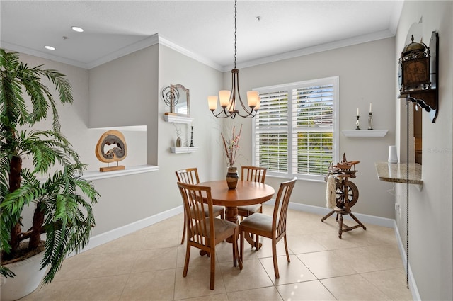 dining room with light tile patterned floors, crown molding, and a notable chandelier