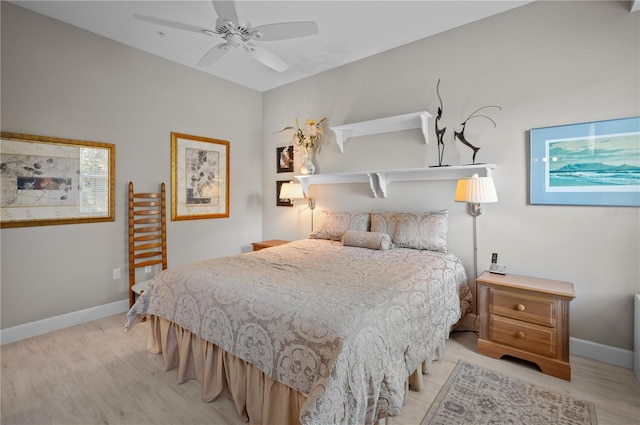 bedroom featuring ceiling fan and light hardwood / wood-style floors