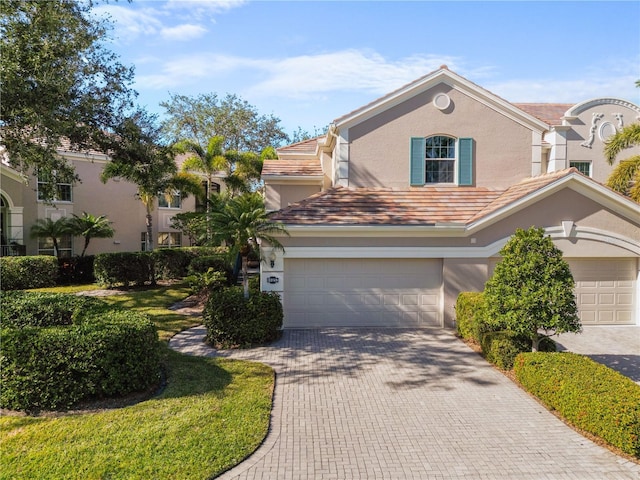 view of front of property with a garage