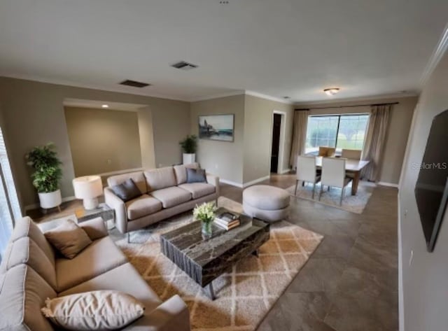 living room with ornamental molding