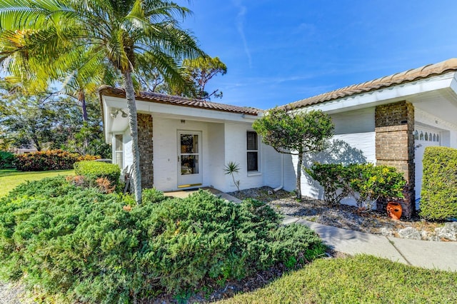 view of front of home with a garage