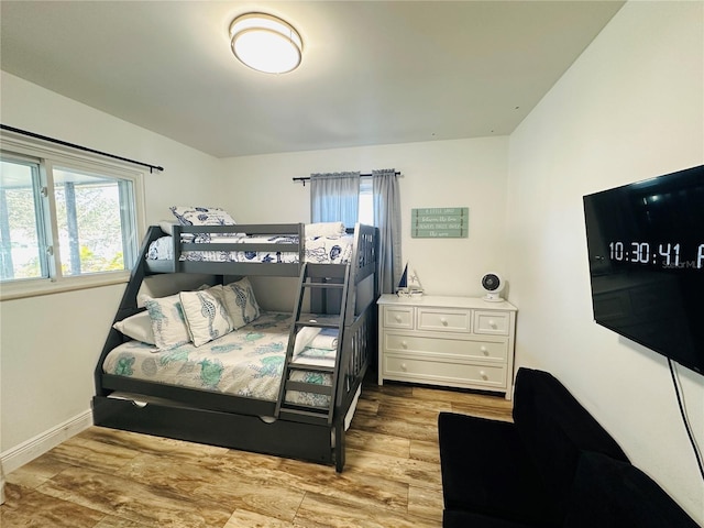 bedroom with light hardwood / wood-style flooring