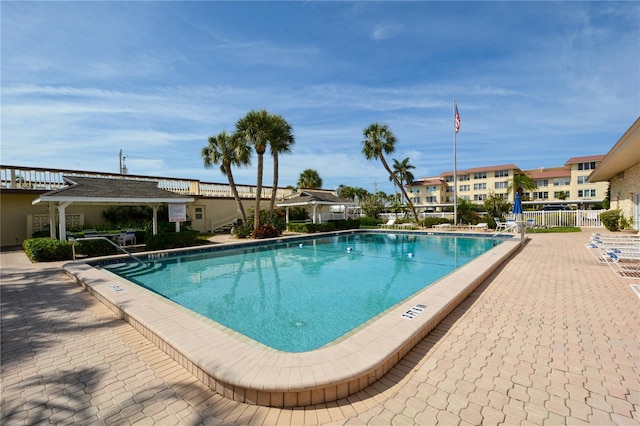 view of pool featuring a patio